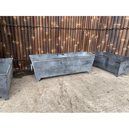 106 - LARGE RECTANGULAR STEEL ORNATE PLANTER ON FEET WITH HANDLES (120.5CM X 40.5CM X 40CM)