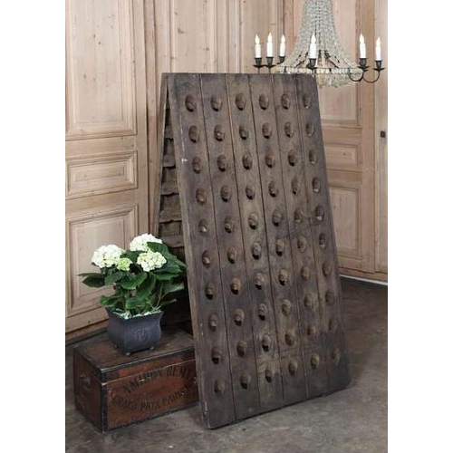 91 - LARGE OAK DOUBLE SIDED 120 BOTTLE WALL HANGING ANTIQUE OAK CHAMPAGNE RACK