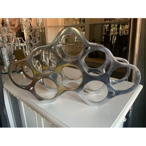 66 - BOXED NICKEL DECORATIVE BOTTLE RACK