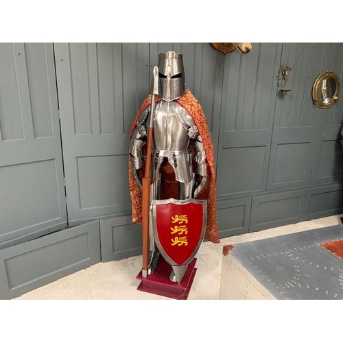 96 - HUGE MEDIEVAL DECORATIVE SUIT OF ARMOUR IN POLISHED STEEL WITH WITH SHIELD IN RED ROBE