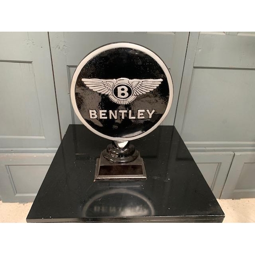 64 - CAST METAL BLACK AND SILVER BENTLEY GLOBE/PLAQUE ON STAND