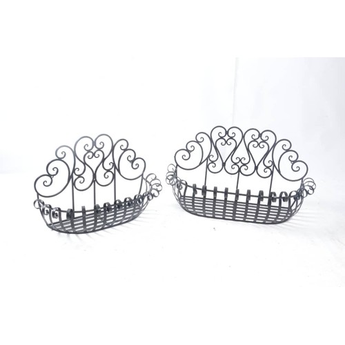 16 - DECORATIVE TWO PIECE IRON ORNATE WALL HANGING PLANTERS