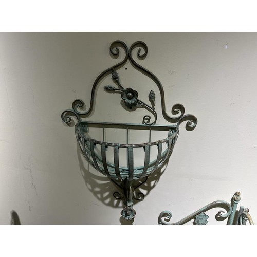 19 - IRON ORNATE WALL HANGING PLANTER WITH FLOWER DETAILING