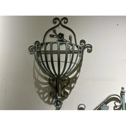 19 - IRON ORNATE WALL HANGING PLANTER WITH FLOWER DETAILING