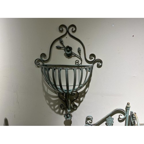 19 - IRON ORNATE WALL HANGING PLANTER WITH FLOWER DETAILING