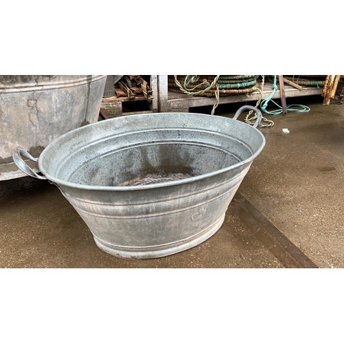 109 - LARGE ANTIQUE ZINC OVAL BATHTUB PLANTER APPROX 90CM-100CM