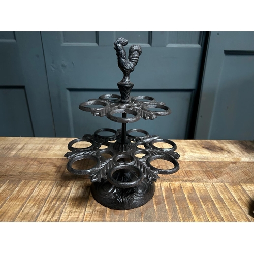 71 - CAST IRON ORNATE EGG HOLDER