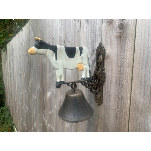 111 - BOXED NEW CAST IRON WALL HANGING COW BELL