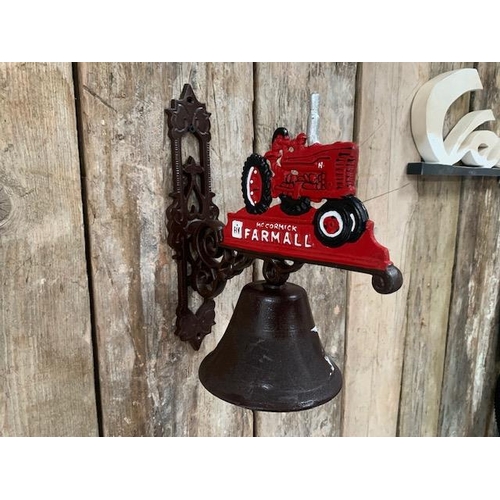 112 - BOXED NEW CAST IRON WALL HANGING FARMALL BELL