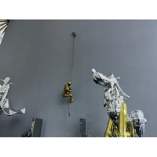 113 - UNIQUE MODERN ART CAST IRON MAN CLIMBING ON ROPE ORNAMENT - GOLD