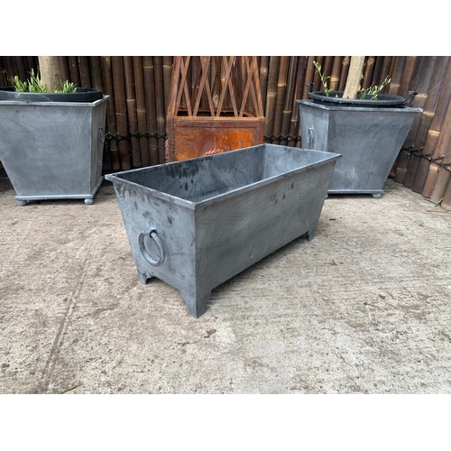 130 - 1 X CLASSIC ORNATE STEEL PLANTER ON LEGS WITH SIDE HANDLES IN LEAD FINISH (80CM X 36CM X 35CM)