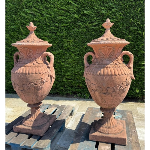 8 - MATCHING PAIR CLASSICAL STONE COMPOSITE 5FT TALL ORNATE URNS WITH HANDLES AND LID IN ANTIQUE TERRACO... 