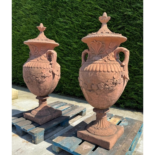 8 - MATCHING PAIR CLASSICAL STONE COMPOSITE 5FT TALL ORNATE URNS WITH HANDLES AND LID IN ANTIQUE TERRACO... 