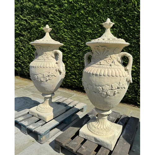 21 - MATCHING PAIR CLASSICAL STONE COMPOSITE 5FT TALL ORNATE URNS WITH HANDLES AND LID IN SANDSTONE FINIS... 