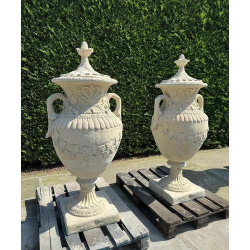 21 - MATCHING PAIR CLASSICAL STONE COMPOSITE 5FT TALL ORNATE URNS WITH HANDLES AND LID IN SANDSTONE FINIS... 