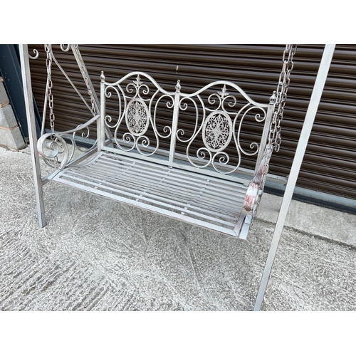 48 - BOXED NEW ORNATE METAL SWING BENCH IN ANTIQUE GREY FINISH (150CM LONG X 88CM DEEP X 210CM TALL)