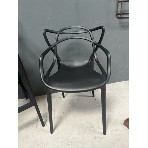 3 - BOX OF 4 NEW DESIGNER PLASTIC PHILIPPE STARCK INSPIRED DINING CHAIRS IN BLACK