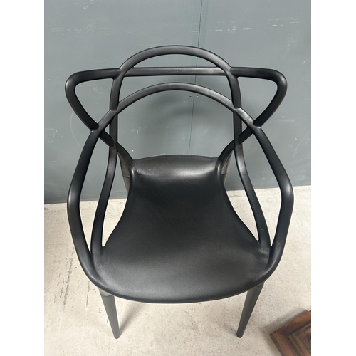 3 - BOX OF 4 NEW DESIGNER PLASTIC PHILIPPE STARCK INSPIRED DINING CHAIRS IN BLACK