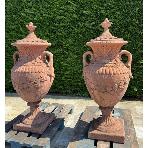 32 - MATCHING PAIR CLASSICAL STONE COMPOSITE 5FT TALL ORNATE URNS WITH HANDLES AND LID IN ANTIQUE TERRACO... 