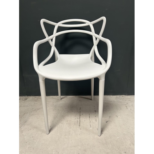 51 - BOX OF 4 NEW DESIGNER PLASTIC PHILIPPE STARCK INSPIRED DINING CHAIRS IN WHITE