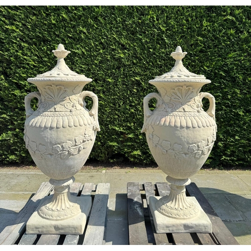 8 - MATCHING PAIR CLASSICAL STONE COMPOSITE 5FT TALL ORNATE URNS WITH HANDLES AND LID IN ANTIQUE SANDSTO... 