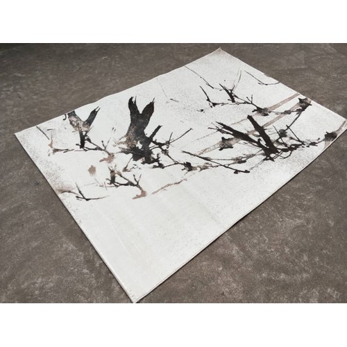 128 - NEW HUGE 2.3M ABSTRACT WHITE AND BLACK PATTERNED RUG