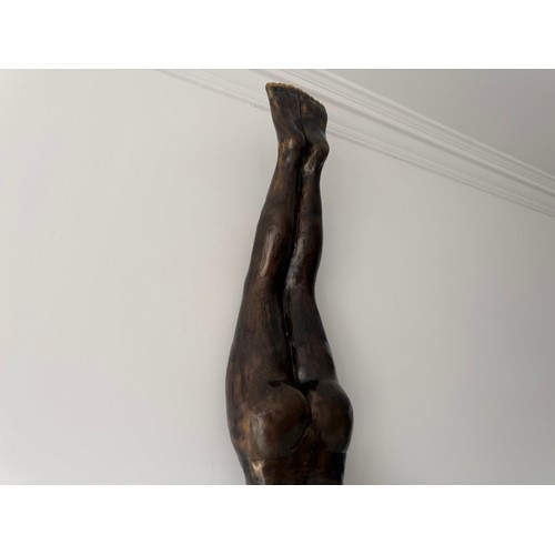 36 - CAST BRASS HANGING WALL SCUPTURE OF A MAN DIVING 120CM LONG