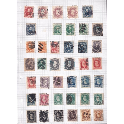 69 - Old pages with over 1000 different stamps from early classics to 1979 in need of rehousing with a ve... 