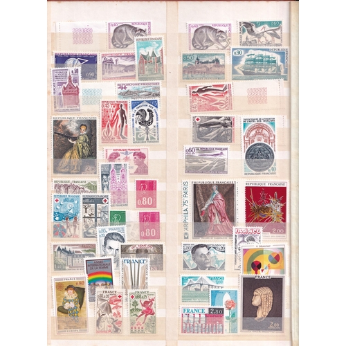 166 - Stockbook with a range of 500 stamps mint inc UM with sets. A useful range.