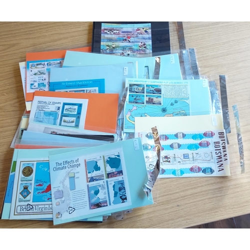 25 - Old pages with many 100's of stamps plus packets with modern MS etc in a interesting and useful rang... 