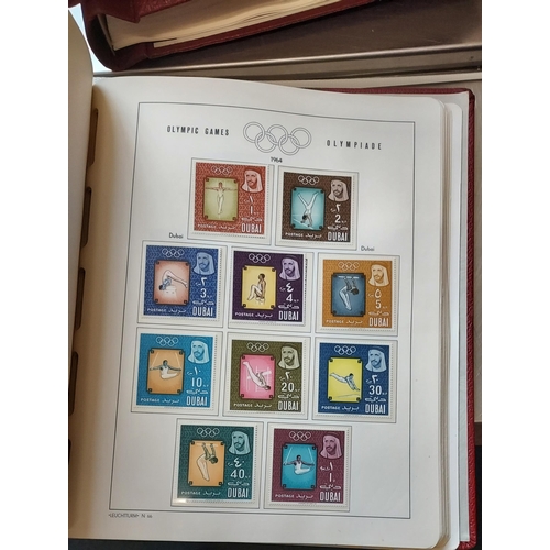 29 - OLYMPIC GAMES 1964 TOKYO - Set of Four Luxurious Lighthouse Hingeless Albums with a substantial coll... 