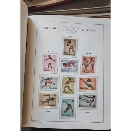 29 - OLYMPIC GAMES 1964 TOKYO - Set of Four Luxurious Lighthouse Hingeless Albums with a substantial coll... 