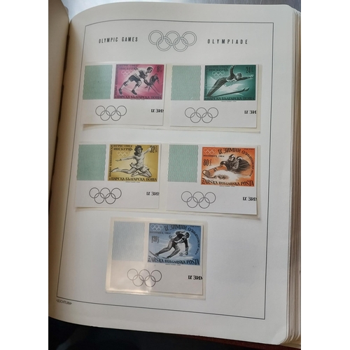 29 - OLYMPIC GAMES 1964 TOKYO - Set of Four Luxurious Lighthouse Hingeless Albums with a substantial coll... 