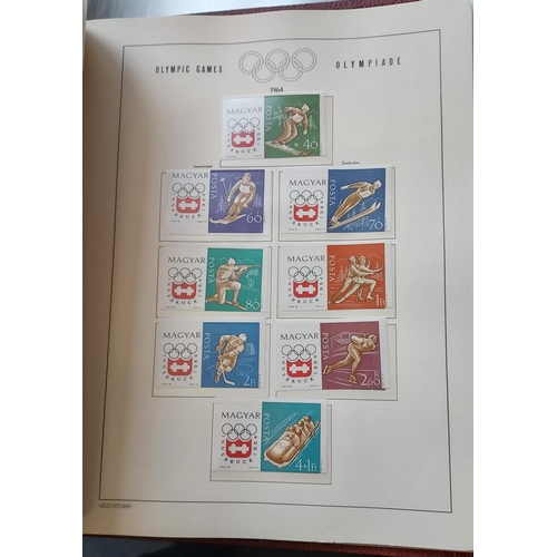 29 - OLYMPIC GAMES 1964 TOKYO - Set of Four Luxurious Lighthouse Hingeless Albums with a substantial coll... 