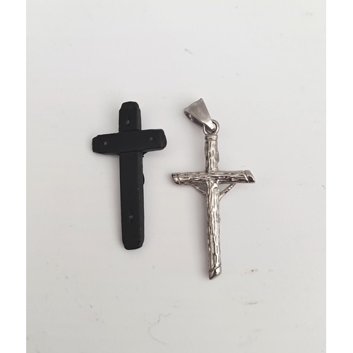 54 - Vintage Crucifix 1 x Wood 1 x silver Coloured Metal. Largest Measures 42mm Long