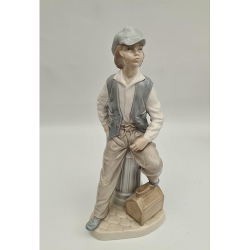 10 - Vintage Lladro Nao Figurine Young Boy Standing by Fire Hydrant Measures 10 inches tall Shipping is a... 