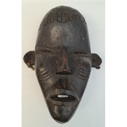 14 - African Sculpture Wooden Tribal Mask. Ethnographic Art. Measures 14 inches by 10 inches by 6 inches ... 