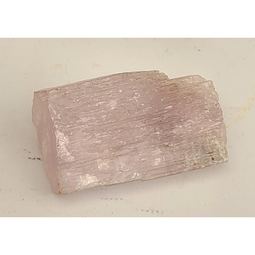 144 - Collectable Rocks and Minerals Pink Kunzite Weight 60g Length 5cm Long. Shipping is available you ca... 