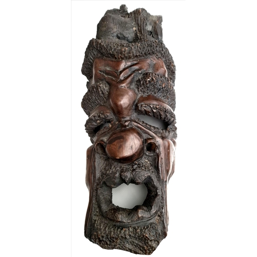 15 - Antiques African Sculptured Wall Grotesque Face Mask 23 inches Tall. With carved baboon or other mon... 