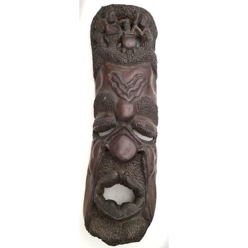 16 - Antiques African Sculptured Wall Grotesque Face Mask 30 inches Tall. With carved baboon or other mon... 