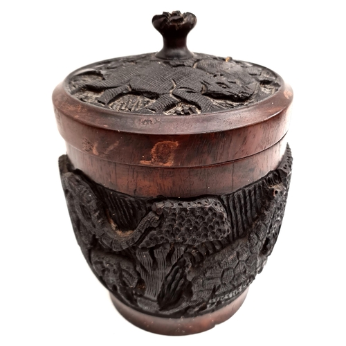 17 - Antiques Wooden Carved Lidded African Storage Jar. Measures 8 inches diameter by 8 inches tall. The ... 