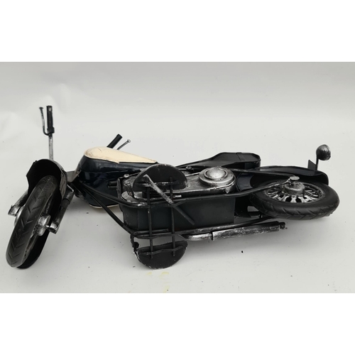 226 - Toy Tin Plate Model of a Motor Bike Measures 13 inches by 8 inches tall. Shipping is available you c... 