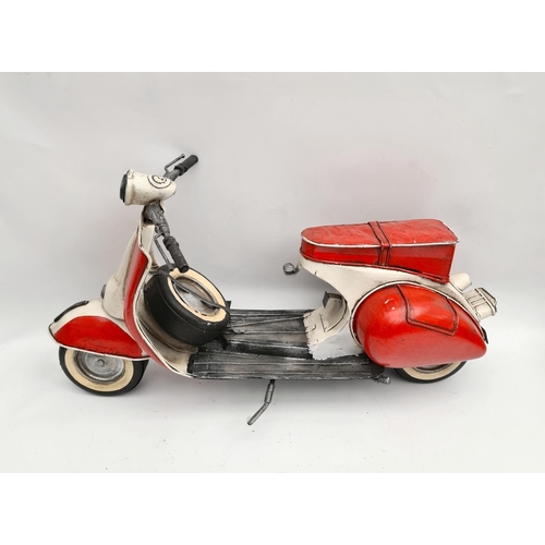 228 - Toy Model of a Vespa Scooter Motor Bike Measures 15 inches by 8 inches tall. Shipping is available y... 