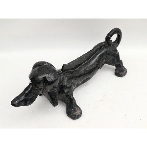 319 - Cast Metal Dachshund Boot Scrape Measures 12 inches long. Shipping is available you can please ask f... 