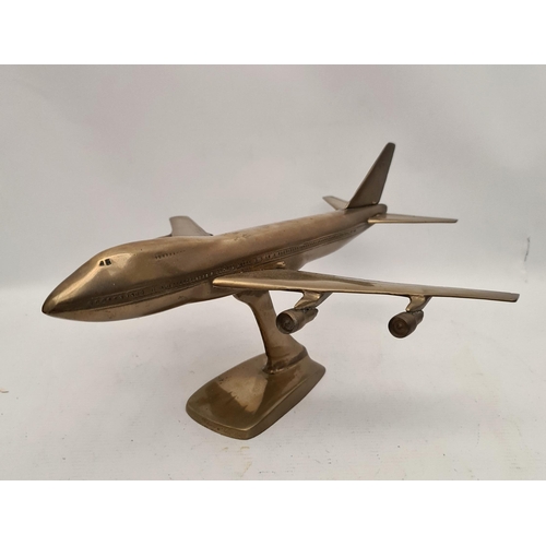 367 - Vintage Brass Boeing 747 Plane on Stand. Measures 38cm long 33cm wide and 18cm tall. Shipping is ava... 