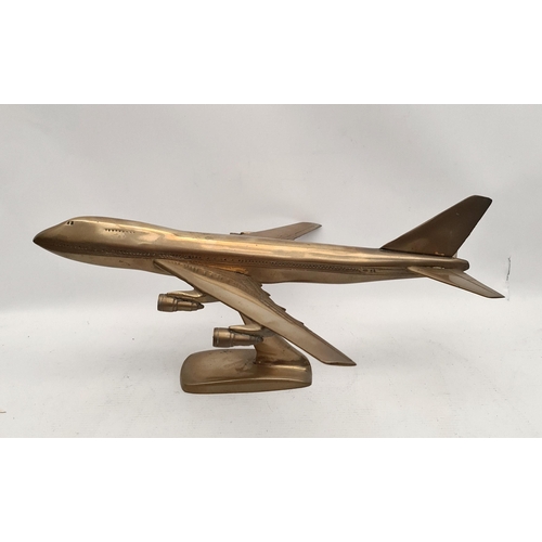 367 - Vintage Brass Boeing 747 Plane on Stand. Measures 38cm long 33cm wide and 18cm tall. Shipping is ava... 