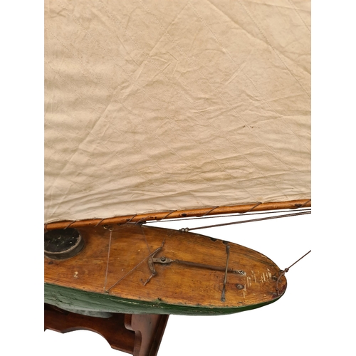 48 - Victorian Pond Yacht Green Hull Fully Rigged Measures 138cm long 147cm tall wooden construction with... 