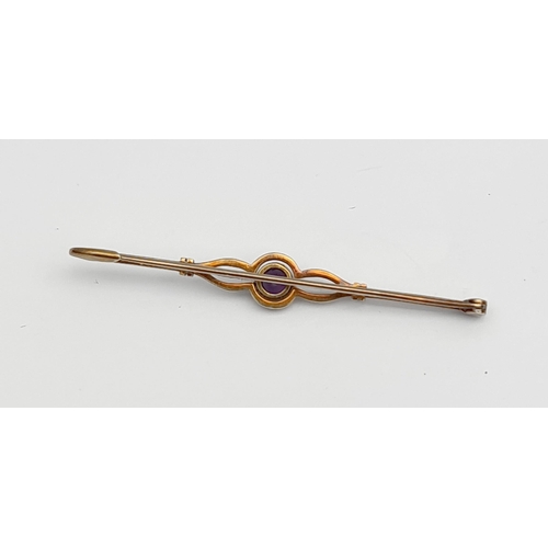 78 - Jewellery 15ct Bar Brooch with Central Amethyst Weight 3g in total Measures 55mm long. Shipping is a... 