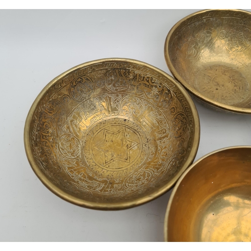 253 - Parcel of  4 Brass Islamic Influenced Bowls. Each Bowl Measures 5 inches diameter by 2 inches tall. ... 