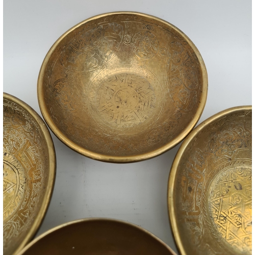 253 - Parcel of  4 Brass Islamic Influenced Bowls. Each Bowl Measures 5 inches diameter by 2 inches tall. ... 